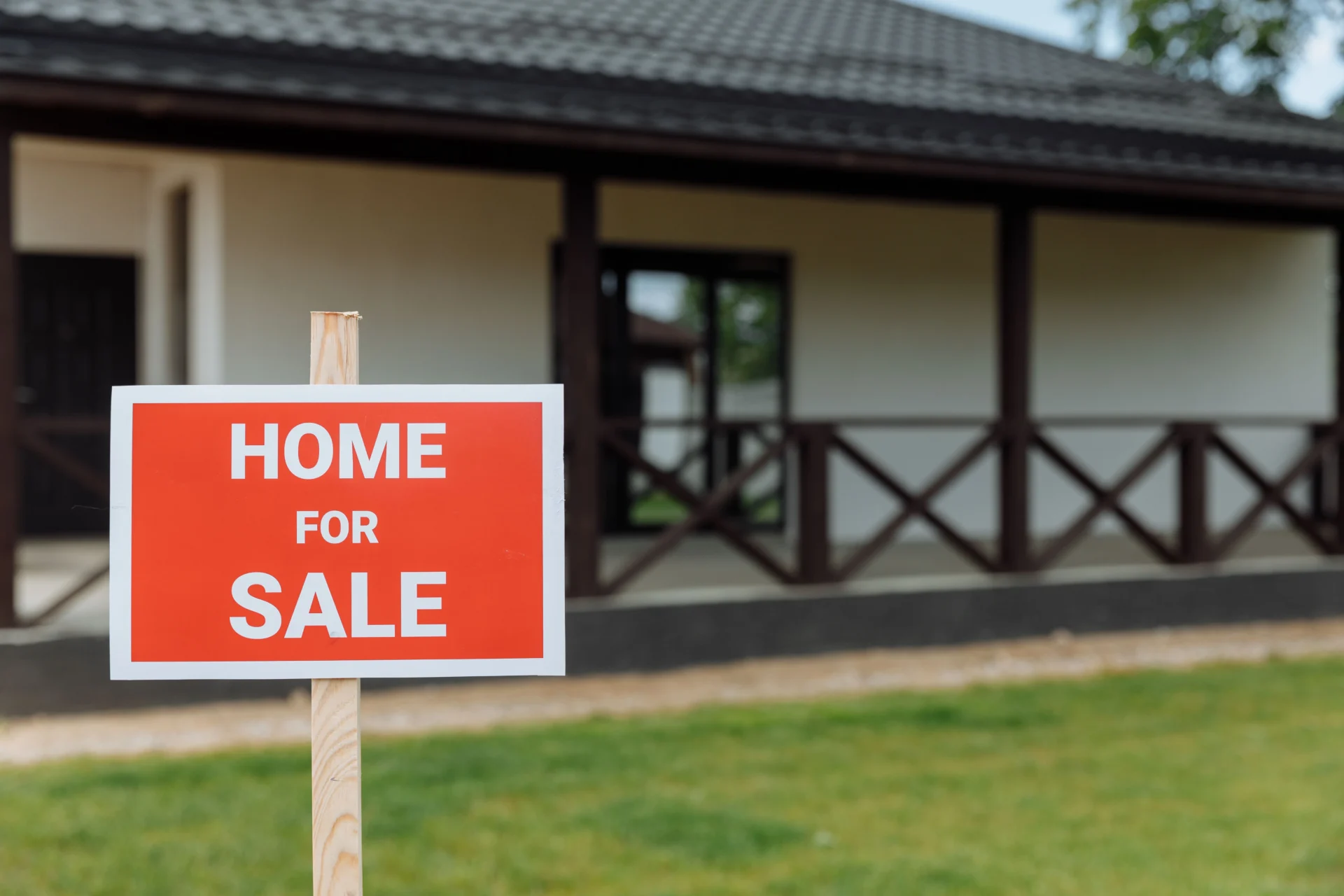 For sale and sold signs outside homes in a UK street in the 2026 property market
